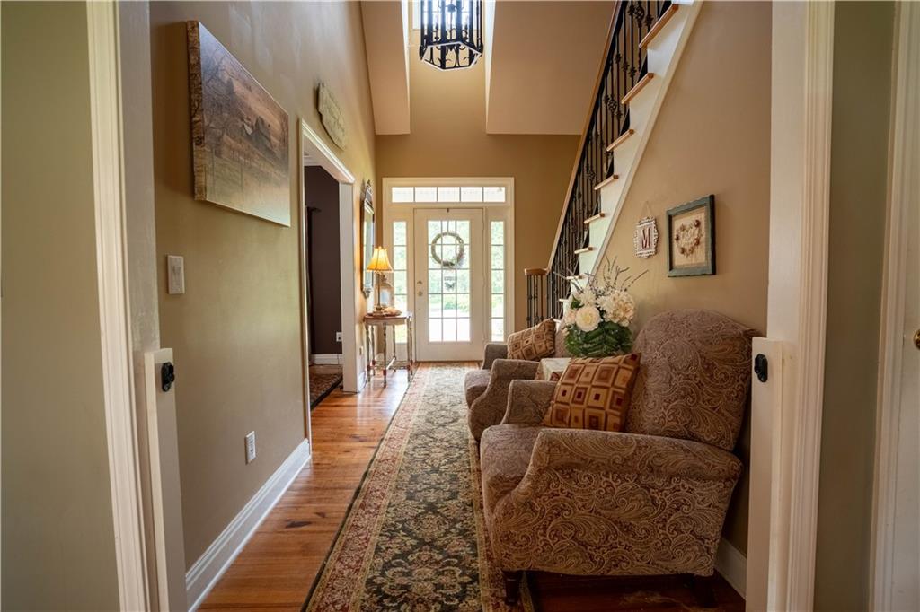 442 Buffalo Creek Road Carrollton, GA 30117 - Photo 9 of 39 a living room with furniture and a fireplace