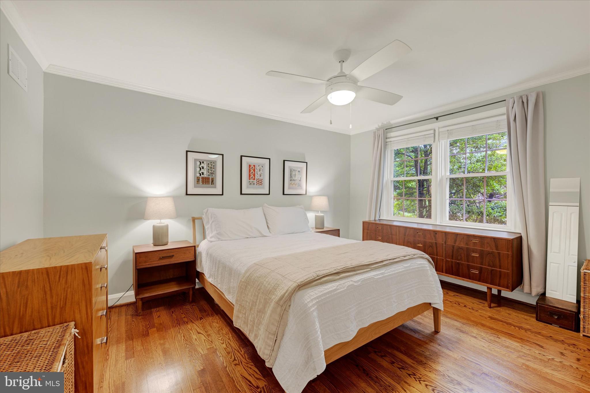 436 Old Trail Baltimore, MD 21212 - Photo 13 of 32 a bedroom with a bed and a large window