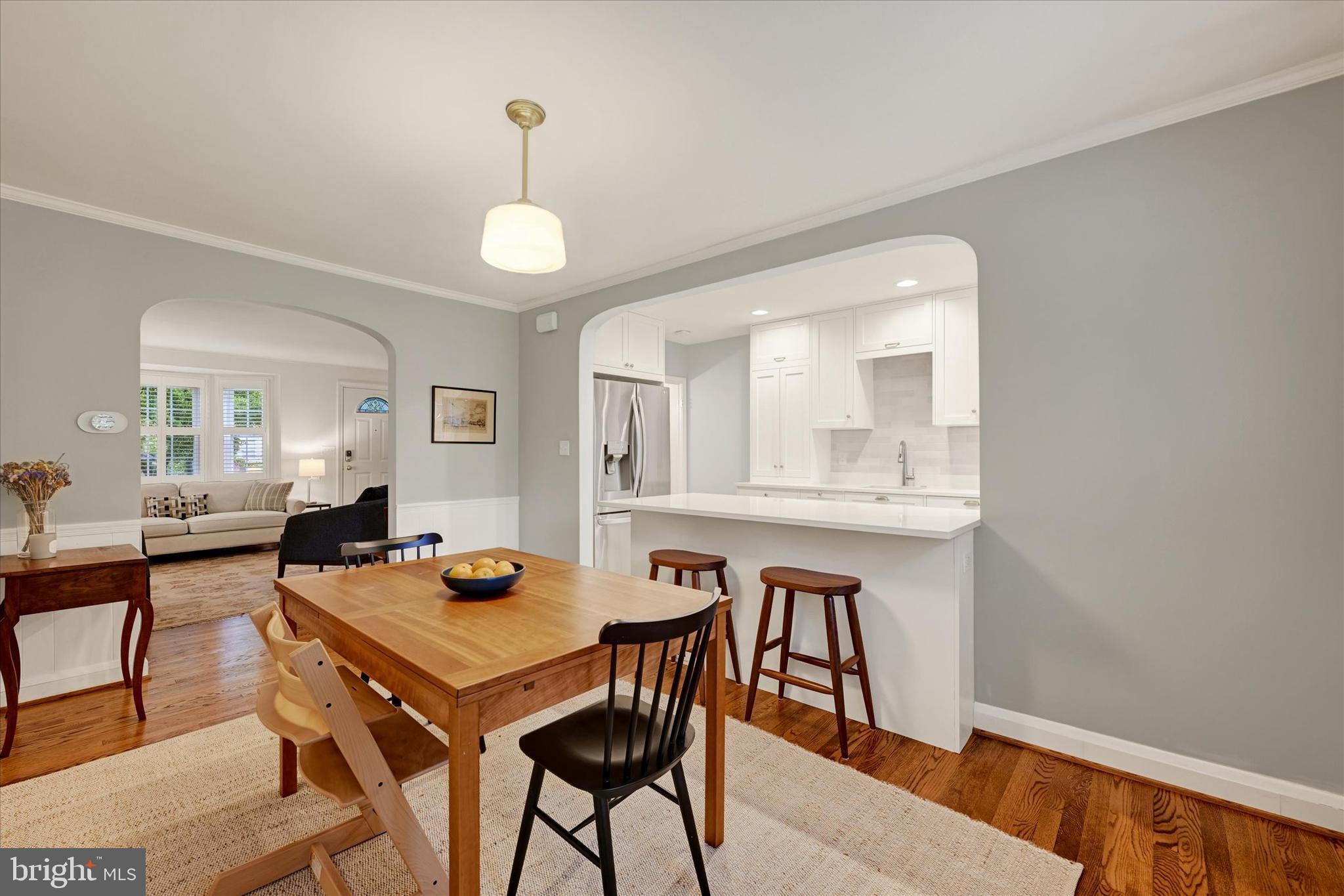 436 Old Trail Baltimore, MD 21212 - Photo 7 of 32 a view of a dining room with a table and chairs
