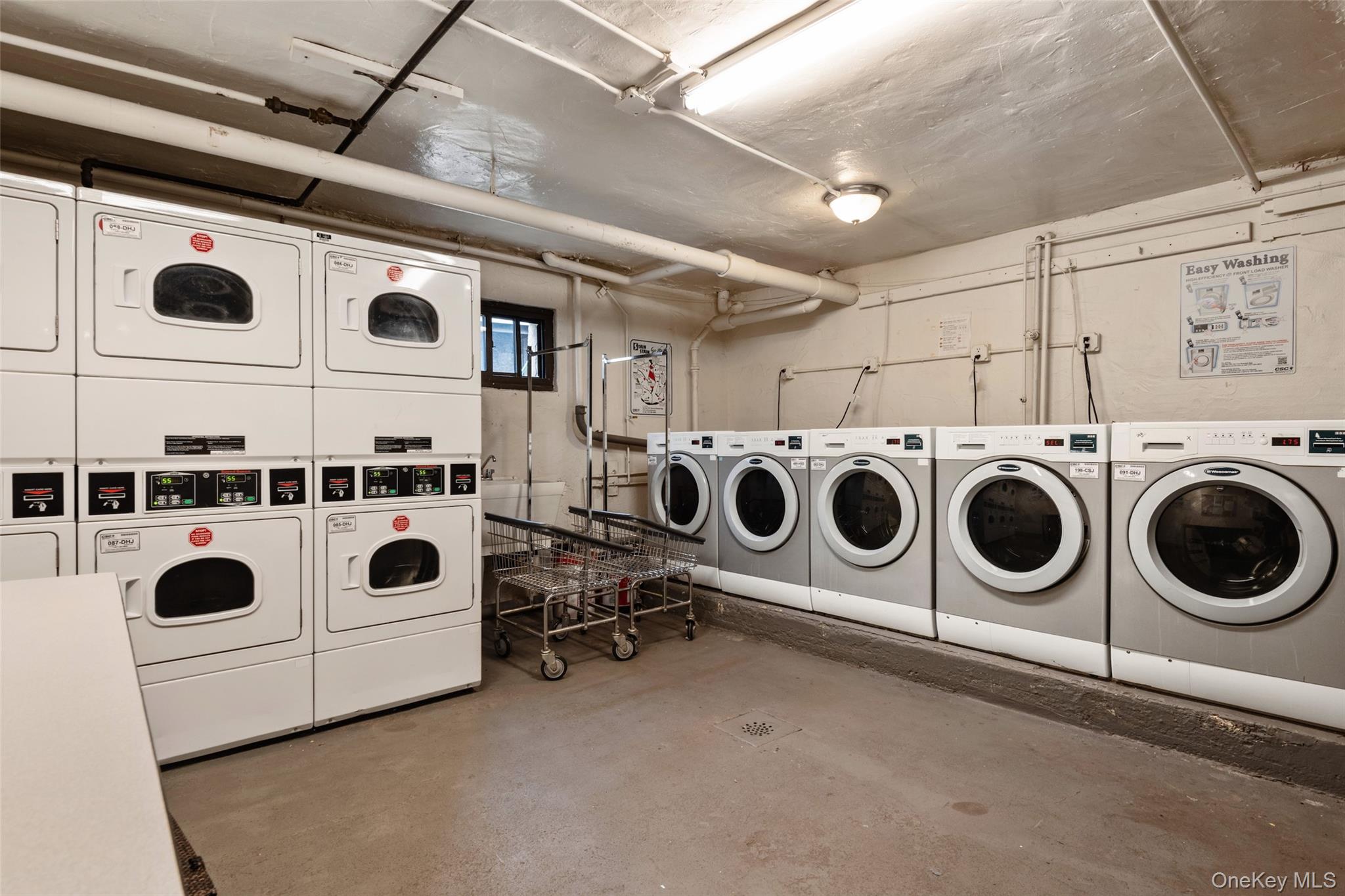 1444 Boston Post Road, Unit 2G Larchmont, NY 10538 - Photo 14 of 15 a utility room with dryer and washer