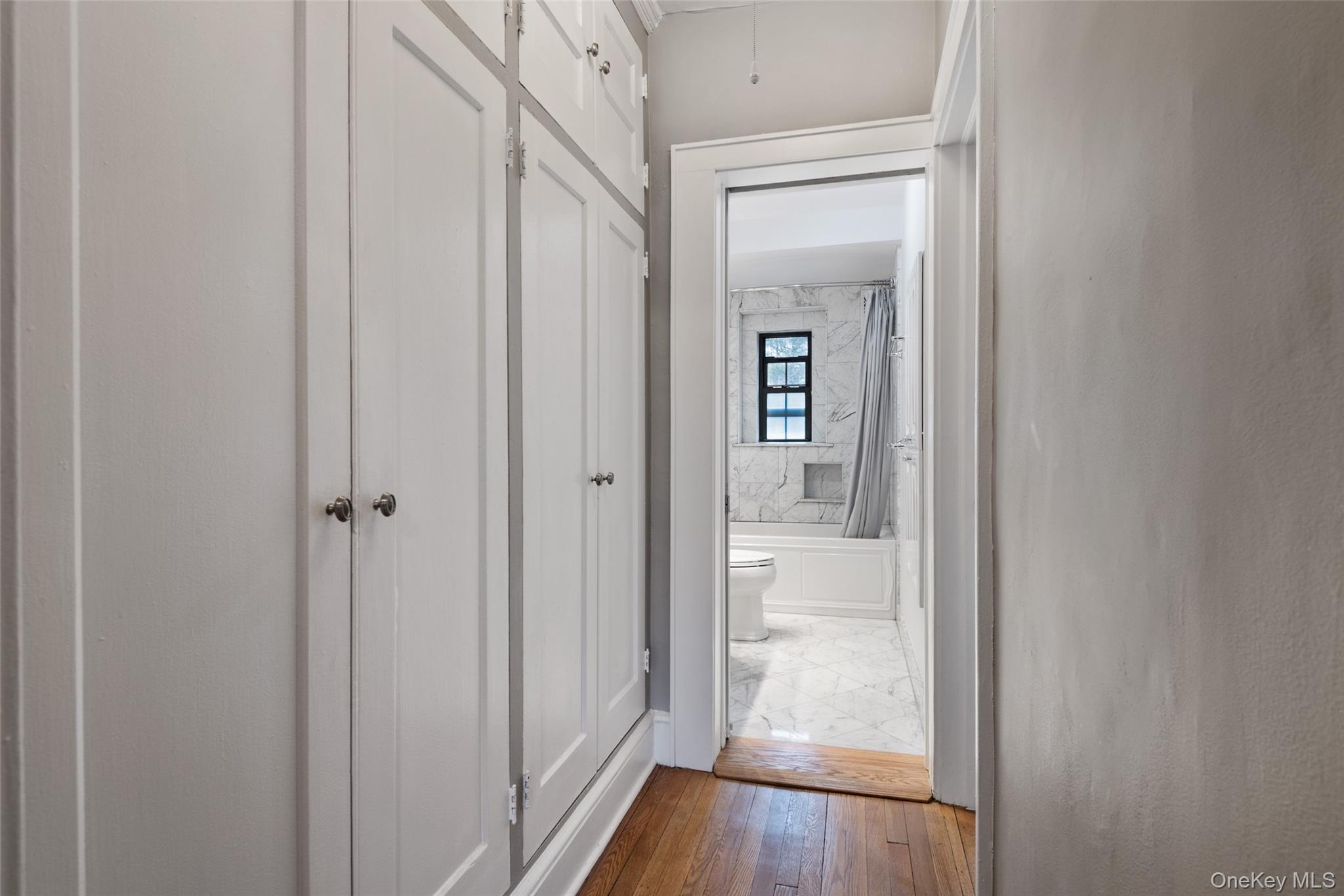1444 Boston Post Road, Unit 2G Larchmont, NY 10538 - Photo 10 of 15 a view of a bathroom from a hallway