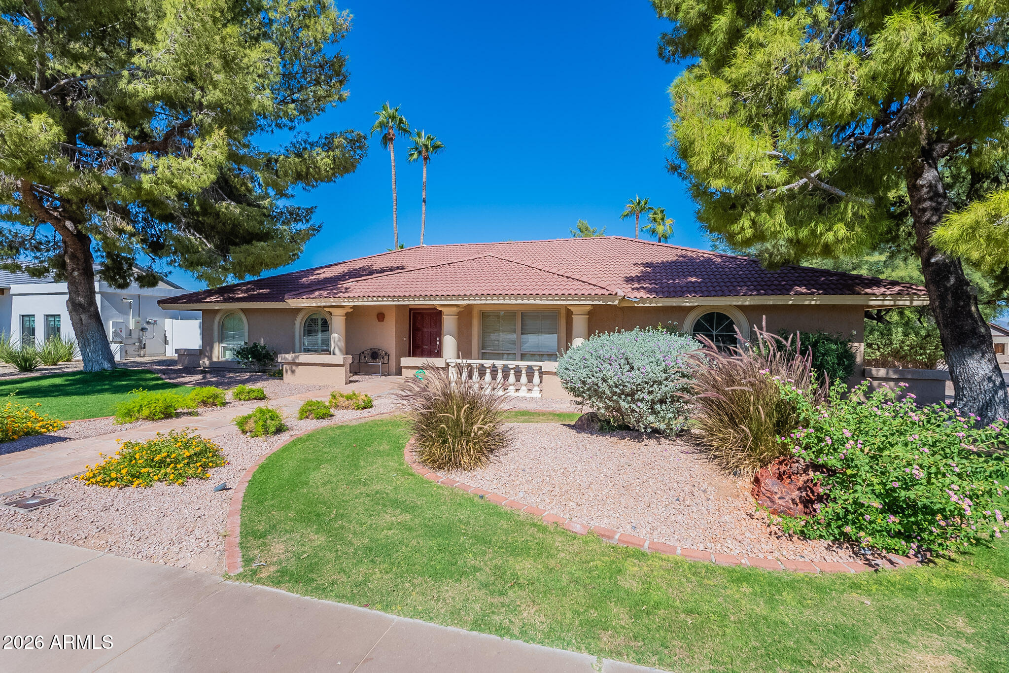 4226 East North Lane Phoenix, AZ 85028 - Photo 4 of 43 a view of a house with swimming pool and sitting area