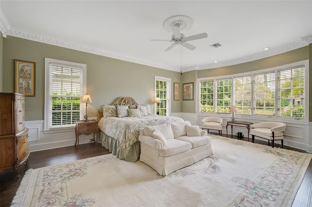 a bedroom with bed and window