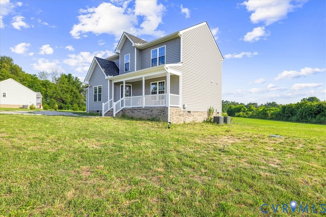 11325 Webb Road Disputanta, VA 23842 - Photo 30 of 32 a view of a house with a yard