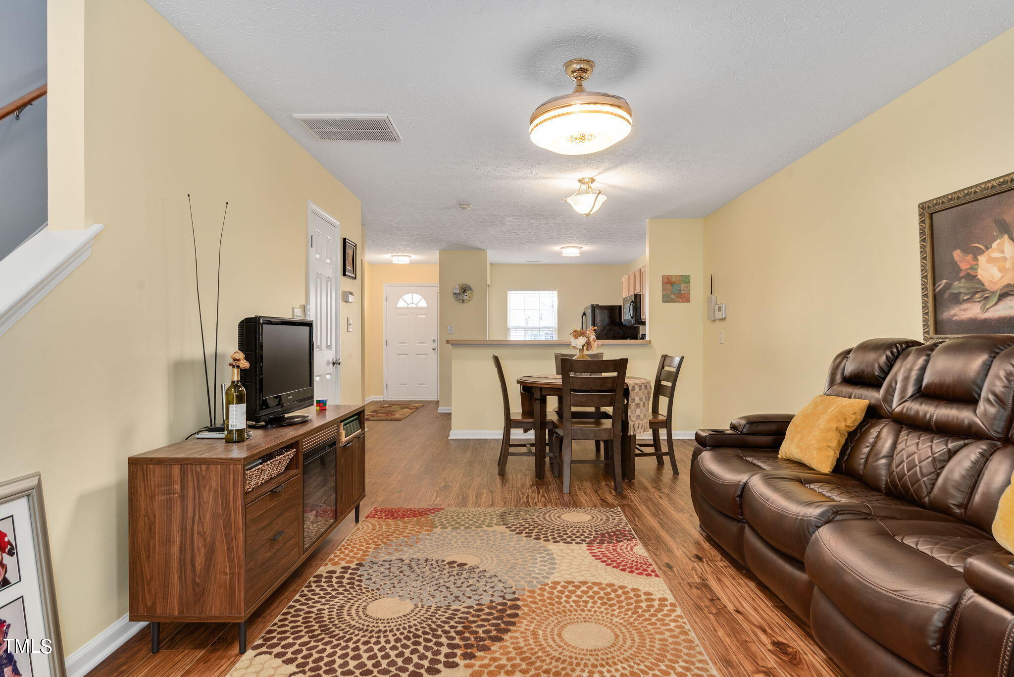 2030 Grassy Banks Drive Raleigh, NC 27610 - Photo 11 of 19 Flow from Living Area to Dining Area