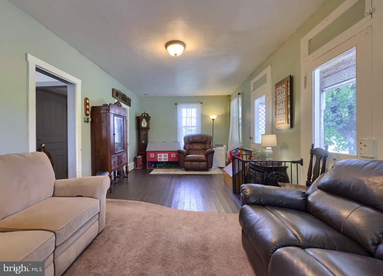 985 Smokestown Road Denver, PA 17517 - Photo 18 of 62 a living room with furniture and a large window