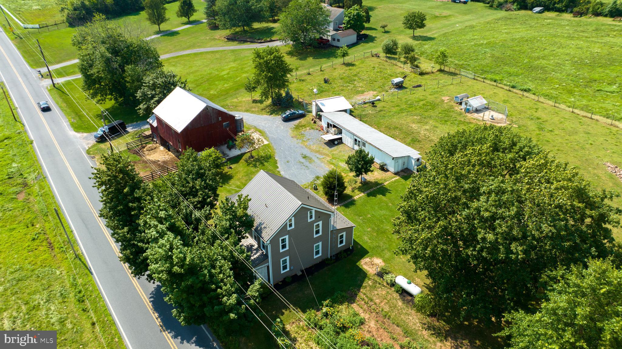 985 Smokestown Road Denver, PA 17517 - Photo 3 of 62 an aerial view of a house with pool yard outdoor seating and yard