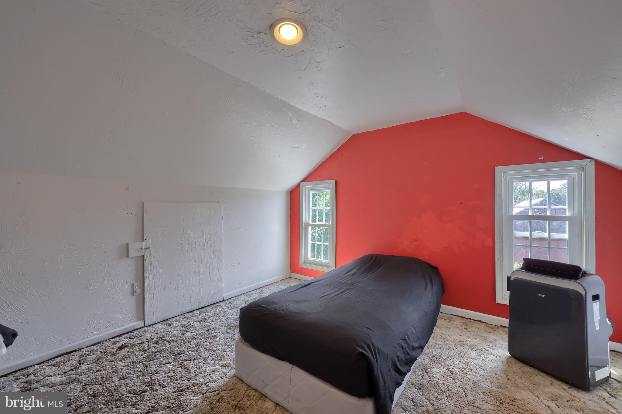 985 Smokestown Road Denver, PA 17517 - Photo 31 of 62 a bedroom with a bed and a window
