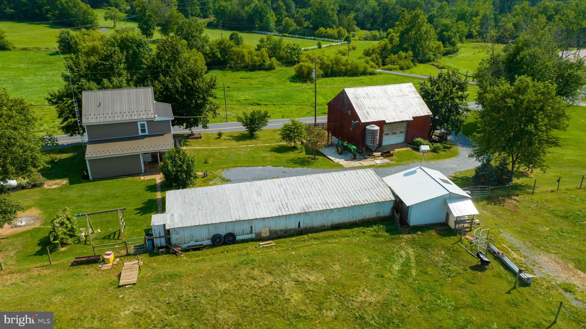 985 Smokestown Road Denver, PA 17517 - Photo 38 of 62 an aerial view of a house with swimming pool garden and patio