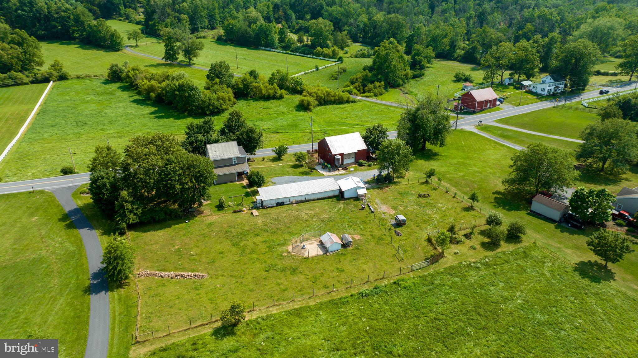 985 Smokestown Road Denver, PA 17517 - Photo 48 of 62 an aerial view of a house with a yard