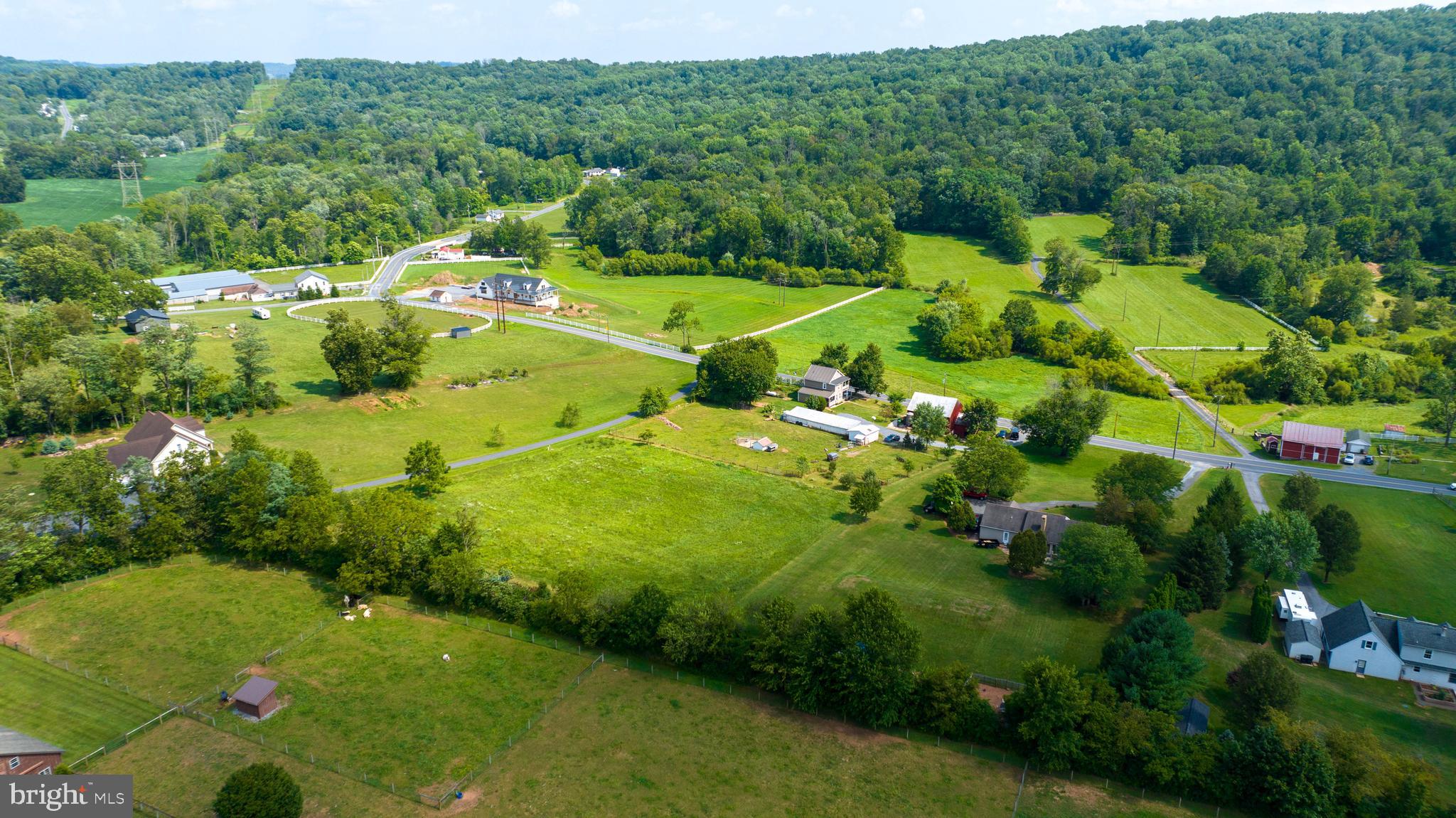 985 Smokestown Road Denver, PA 17517 - Photo 54 of 62 a view of a houses with a lush green forest