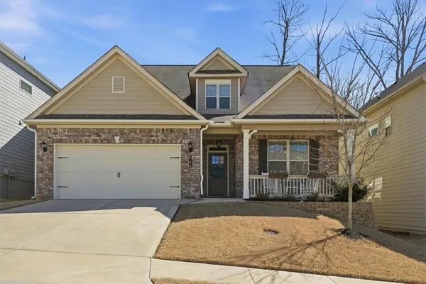 front view of a house with a yard