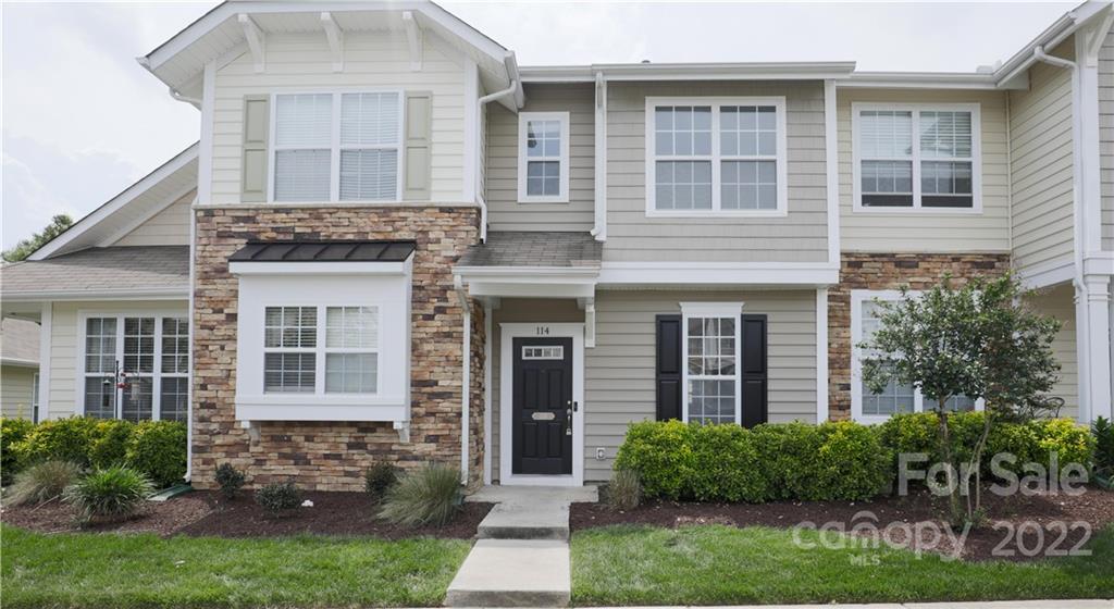 114 Chimney Rock Lane Fort Mill, SC 29708 - Photo 1 of 12 front view of a house with a yard