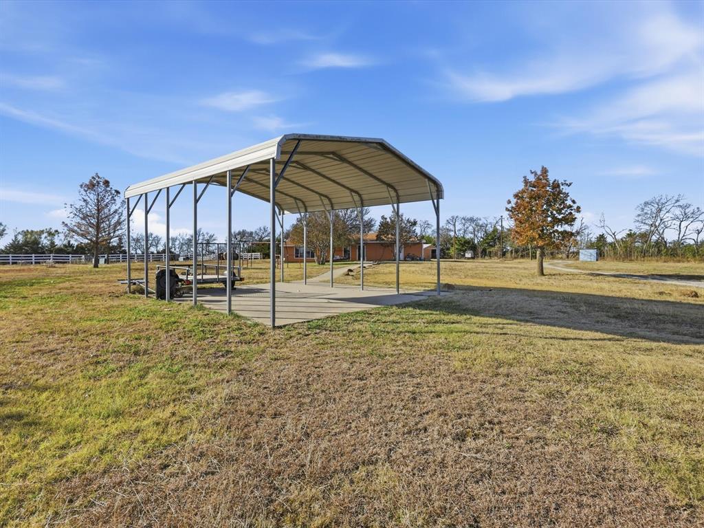 8402 County Road 501 Blue Ridge, TX 75424 - Photo 17 of 23 a view of a lake with a slide