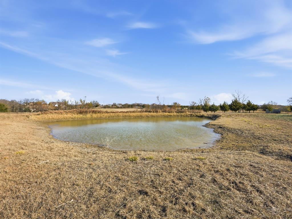 8402 County Road 501 Blue Ridge, TX 75424 - Photo 21 of 23 a view of a lake with a city