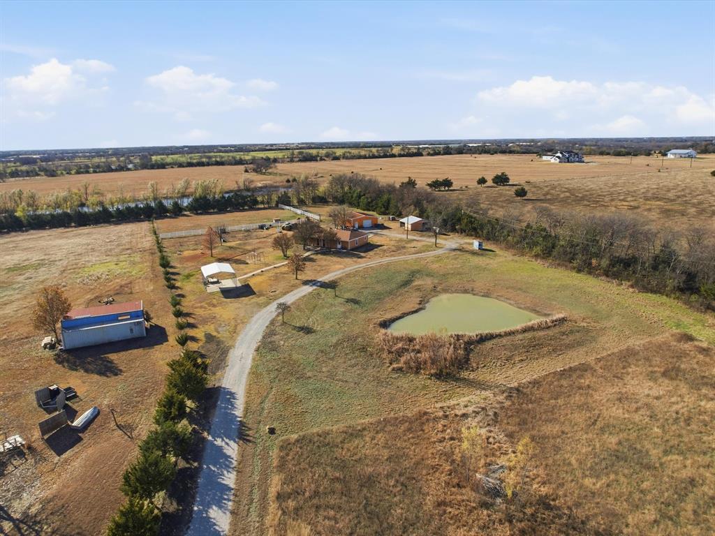 8402 County Road 501 Blue Ridge, TX 75424 - Photo 5 of 23 an aerial view of a house with a lake view