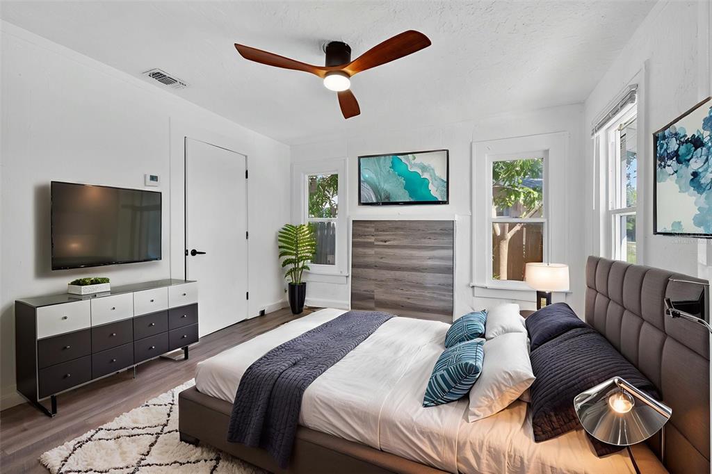 2725 14th Avenue South St. Petersburg, FL 33712 - Photo 11 of 41 a bedroom with a bed and a flat screen tv