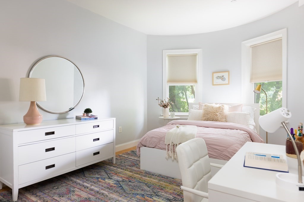 177 Winthrop Road, Unit 3 Brookline, MA 02445 - Photo 4 of 22 a bedroom with a bed and a dresser