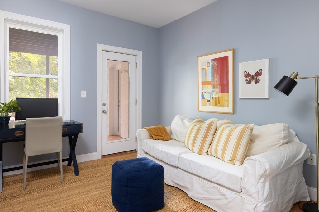 177 Winthrop Road, Unit 3 Brookline, MA 02445 - Photo 6 of 22 a living room with a couch and a window
