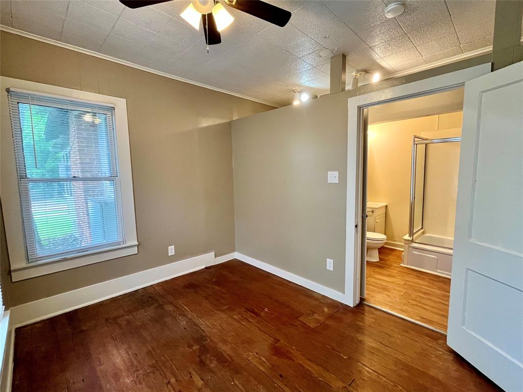 1002 Gregg Street, Unit CB Denton, TX 76201 - Photo 10 of 11 Here is the other side of the room. Notice the beautiful flooring.