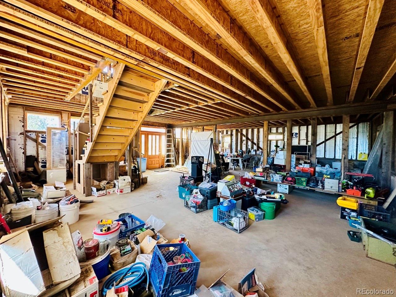 1751 Summitview Way Crestone, CO 81131 - Photo 15 of 50 a view of a room with toys and a chandelier