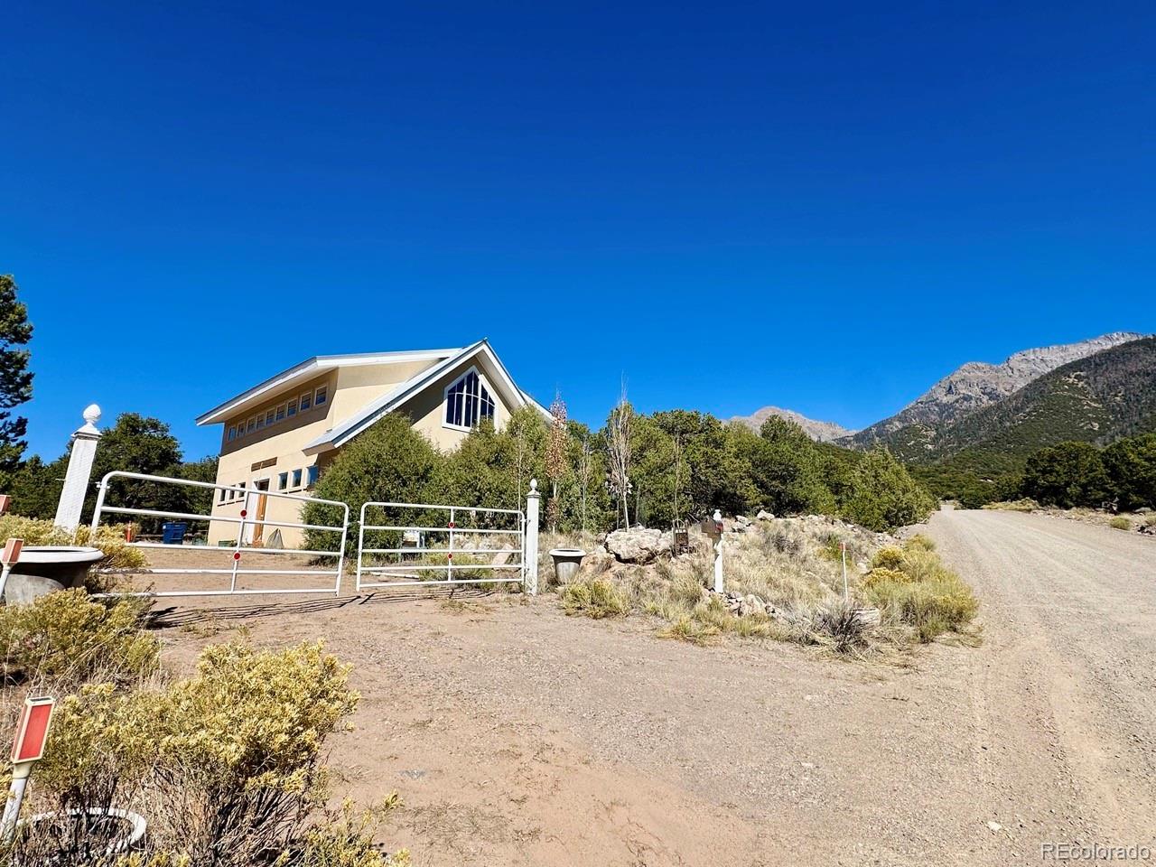 1751 Summitview Way Crestone, CO 81131 - Photo 33 of 50 a view of a house with a yard