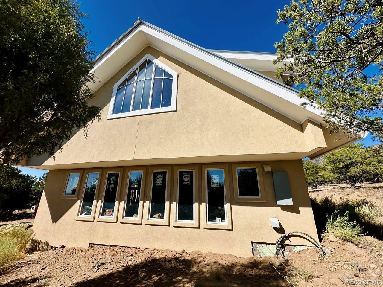 1751 Summitview Way Crestone, CO 81131 - Photo 7 of 50 a view of a house with a yard