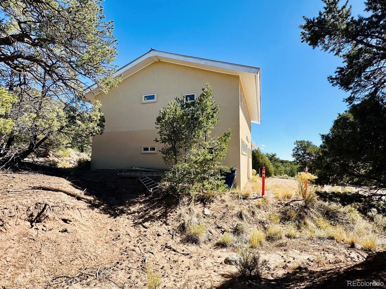 1751 Summitview Way Crestone, CO 81131 - Photo 10 of 50 a view of a house with a yard