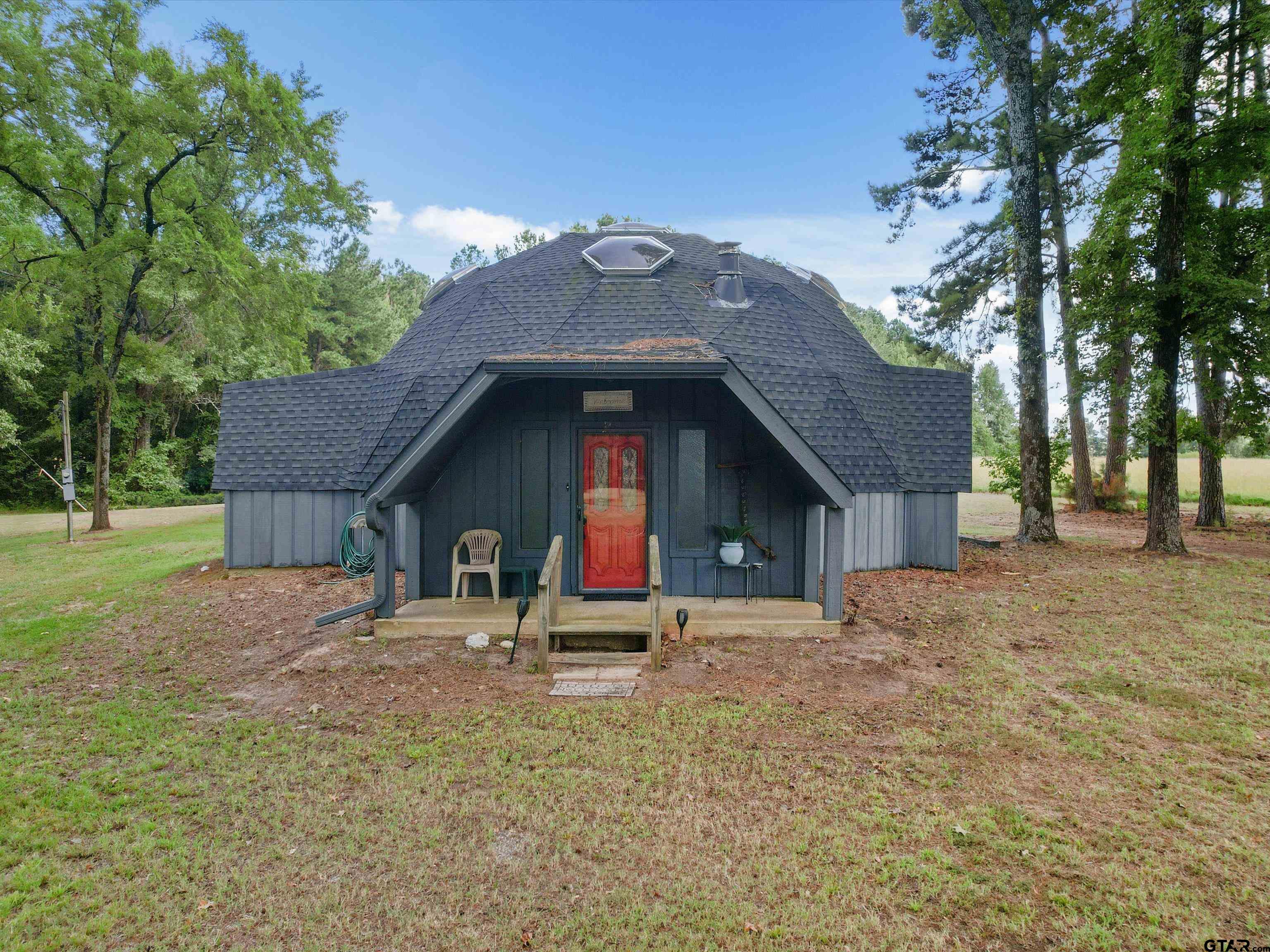 637 County Road 3201 Daingerfield, TX 75638 - Photo 2 of 33 a house view with a outdoor space