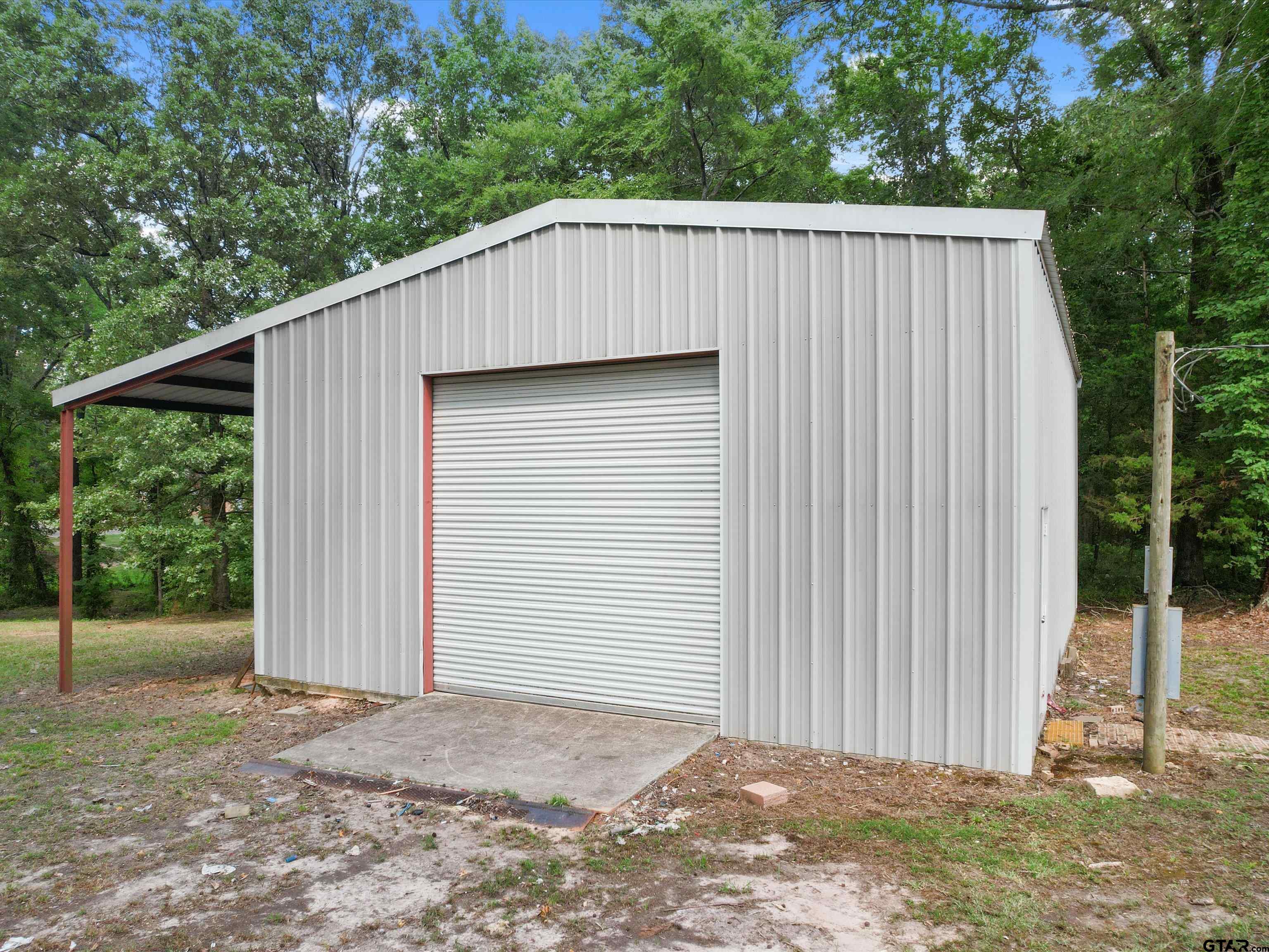 637 County Road 3201 Daingerfield, TX 75638 - Photo 30 of 33 a backyard of a house with lots of green space