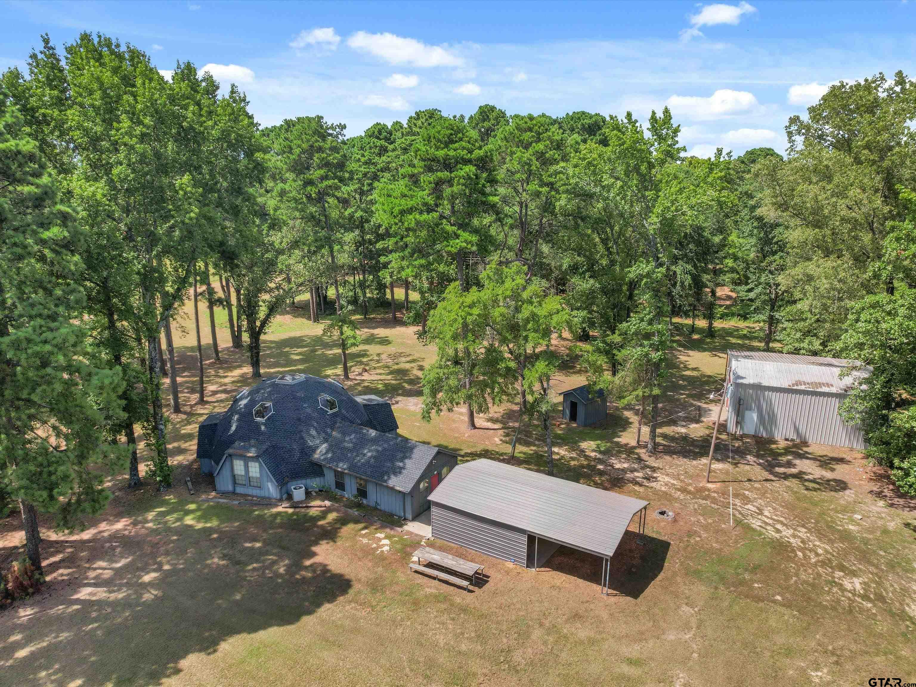 637 County Road 3201 Daingerfield, TX 75638 - Photo 4 of 33 a view of a backyard with sitting area