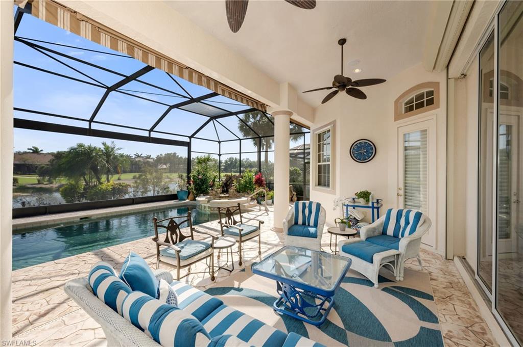 10200 Idle Pine Lane Estero, FL 34135 - Photo 16 of 19 a view of a patio with couches table and chairs