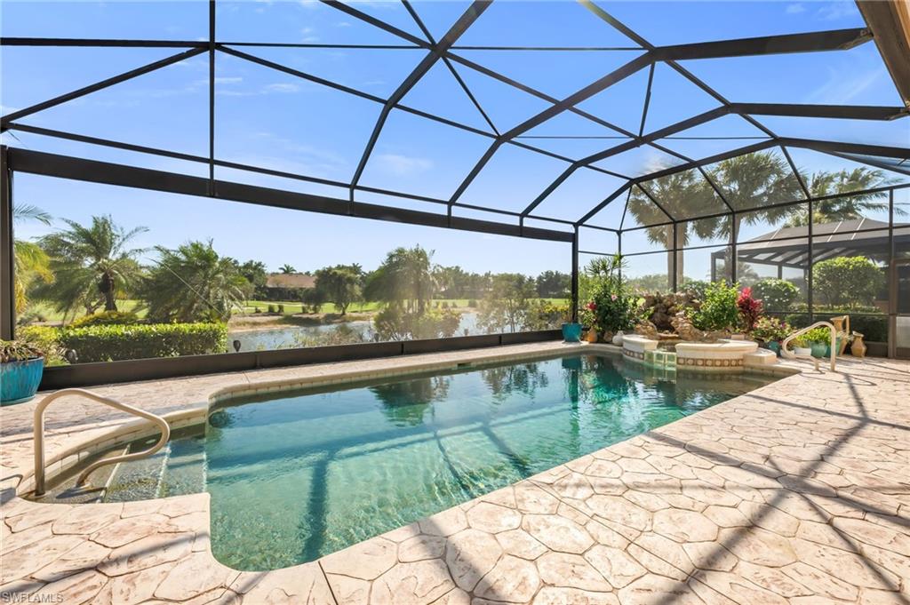 10200 Idle Pine Lane Estero, FL 34135 - Photo 17 of 19 a view of swimming pool with a patio