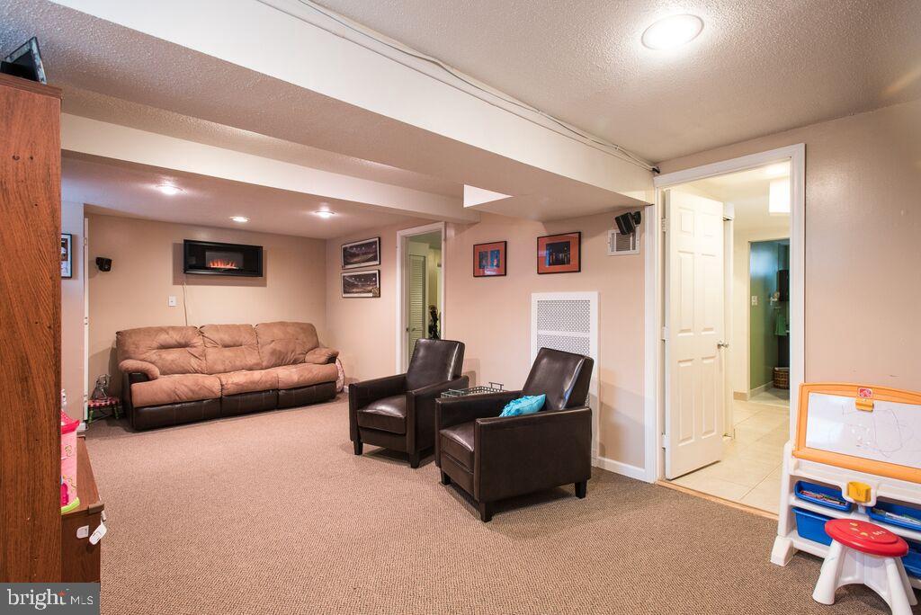 34 Wengate Road Owings Mills, MD 21117 - Photo 9 of 12 Lower level rec room