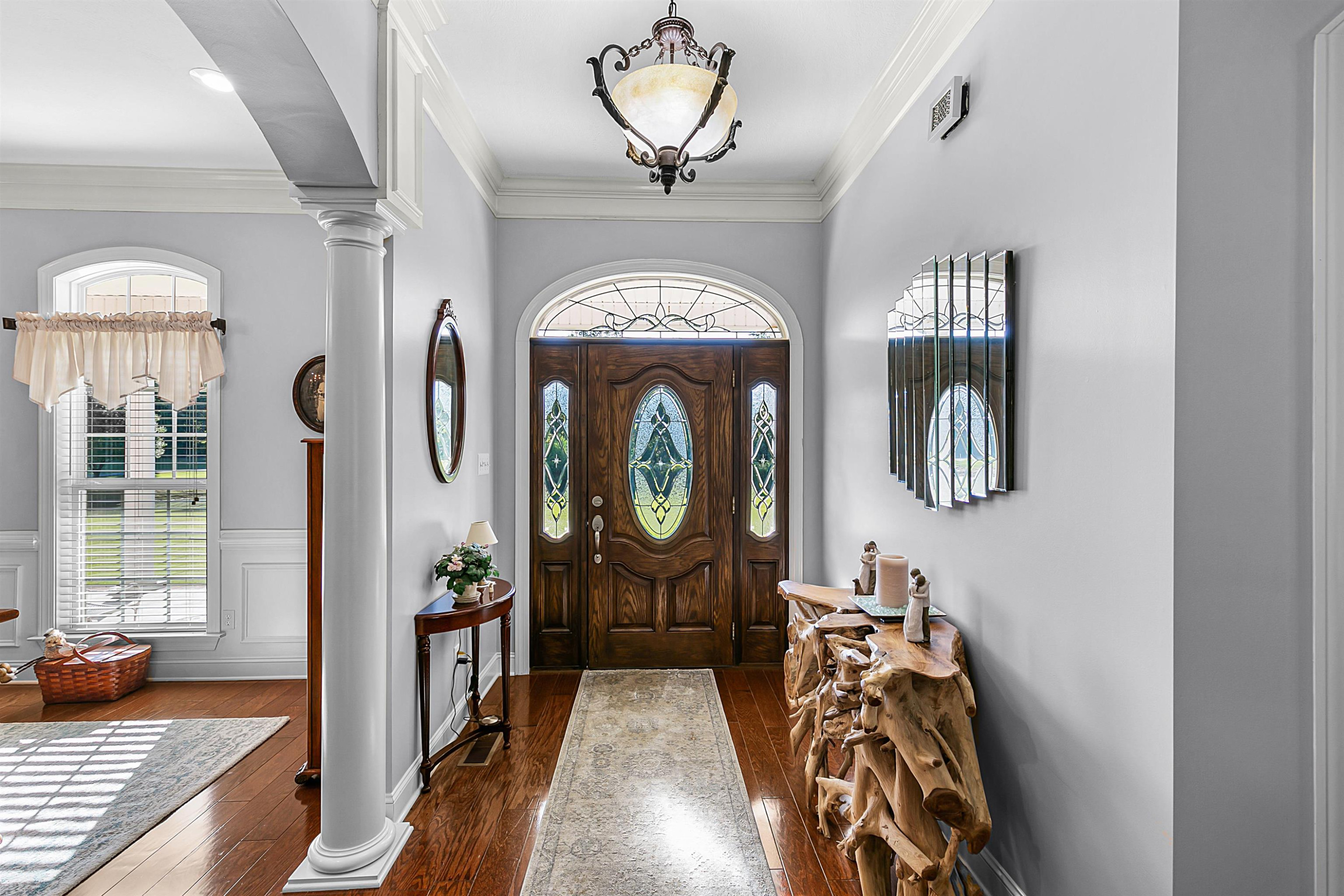 400 Hughes Road East Jackson, TN 38305 - Photo 20 of 36 a view of a entryway with furniture and chandelier