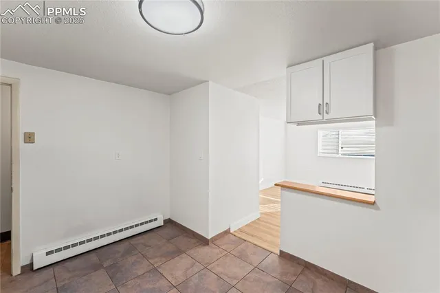 a storage room with washer and dryer