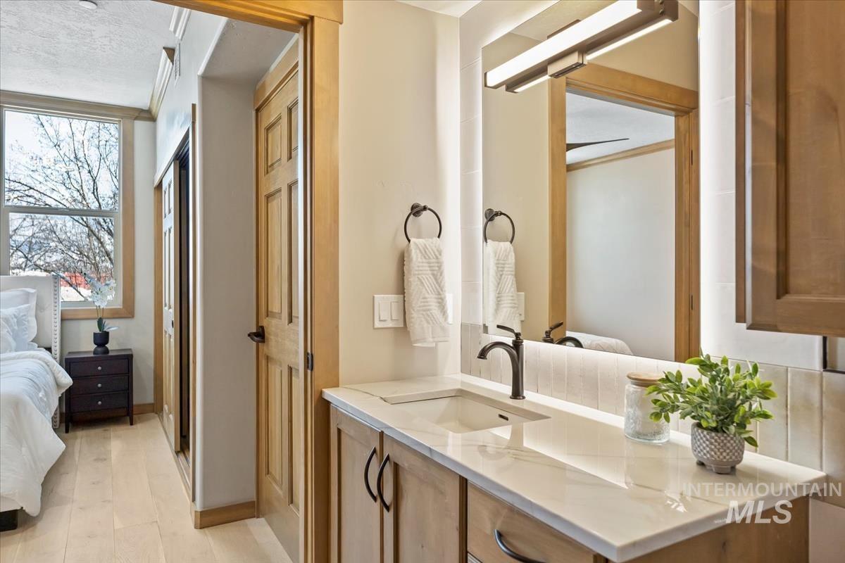 79 East Aikens Road, Unit 202 Eagle, ID 83616 - Photo 23 of 47 Full bath with ensuite bathroom and vanity