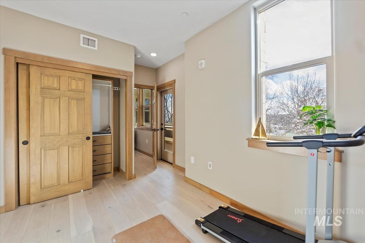 79 East Aikens Road, Unit 202 Eagle, ID 83616 - Photo 26 of 47 Workout room with light wood finished floors and recessed lighting