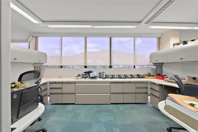 a kitchen with a stove a sink and a refrigerator