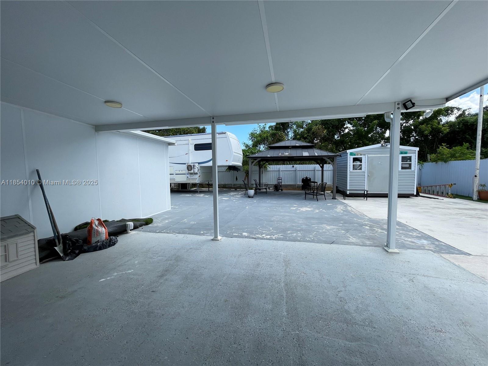 15550 Southwest 308th Street, Unit 15550 Homestead, FL 33033 - Photo 11 of 11 a view of a room with gym equipment