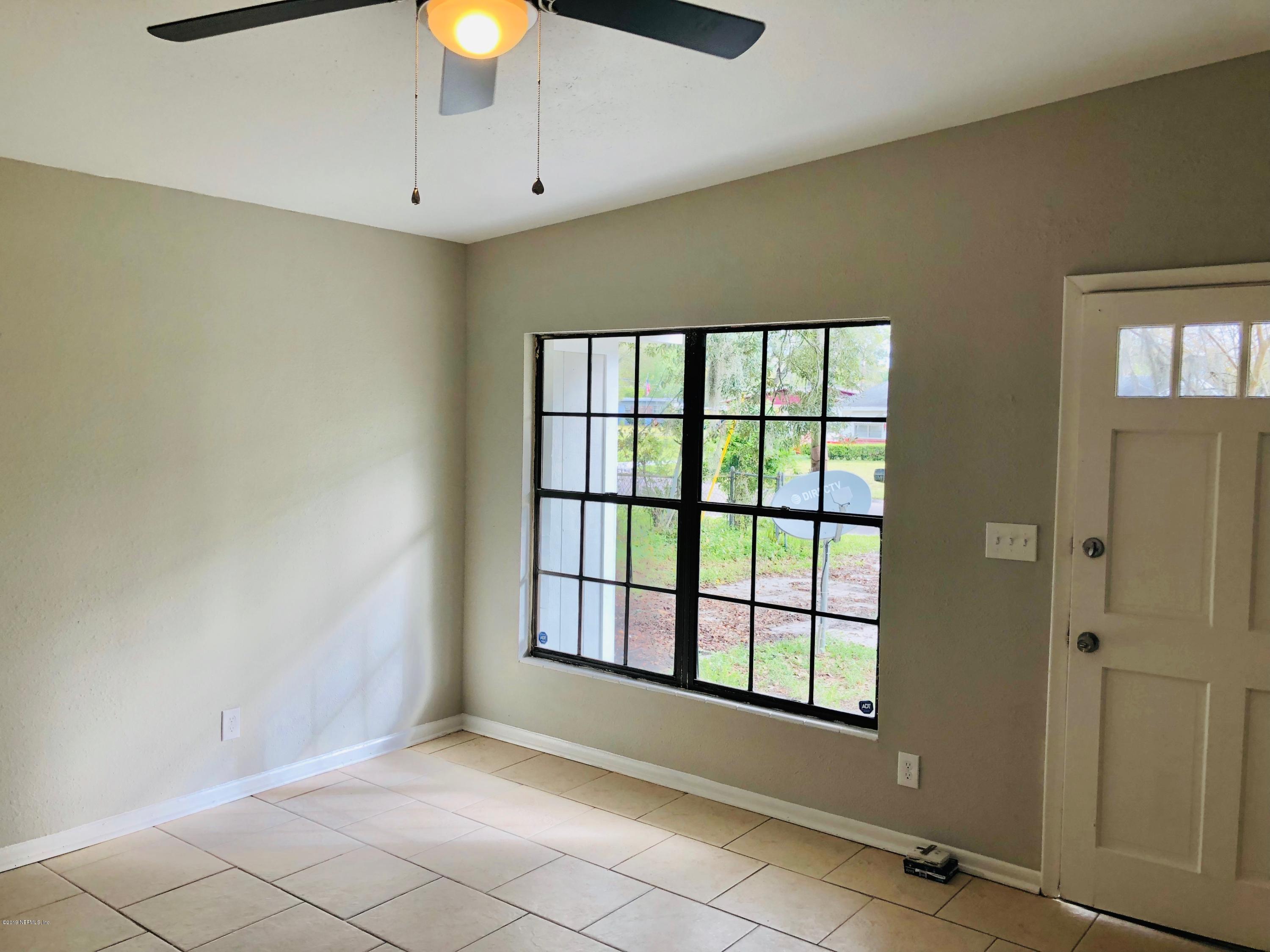 10448 Dodd Road Jacksonville, FL 32218 - Photo 3 of 14 a view of a room with a window