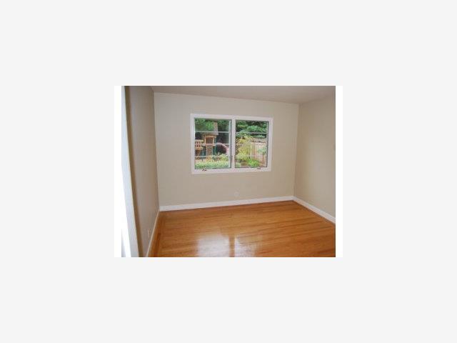 1124 Springer Road Los Altos, CA 94024 - Photo 7 of 9 a view of an empty room with a window