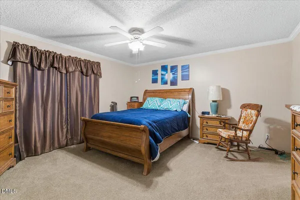 a view of a lake with beach and mountain view