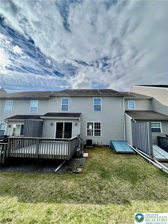 4131 Walter Road Bethlehem, PA 18020 - Photo 13 of 13 a view of a house with a wooden deck and a yard