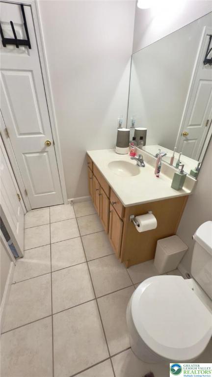 4131 Walter Road Bethlehem, PA 18020 - Photo 9 of 13 a large white kitchen with a sink and a mirror