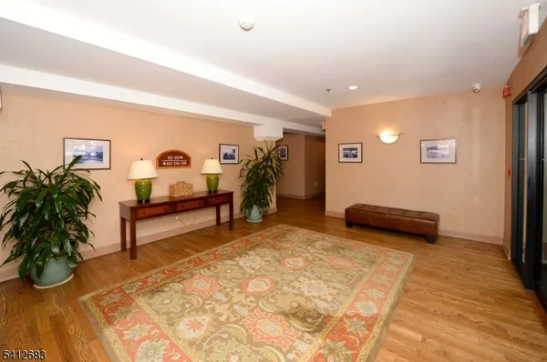 a view of game room with furniture and window