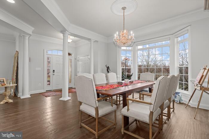 2520 Stone Cliff Drive Baltimore, MD 21209 - Photo 27 of 72 a view of a dining room with furniture window and wooden floor