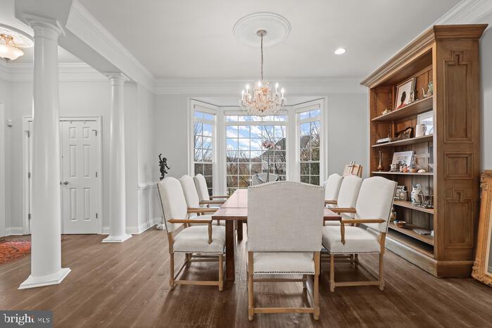 2520 Stone Cliff Drive Baltimore, MD 21209 - Photo 31 of 72 a view of a dining room with furniture window and wooden floor