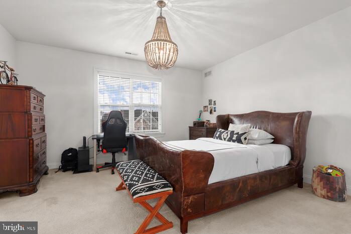 2520 Stone Cliff Drive Baltimore, MD 21209 - Photo 40 of 72 a bedroom with bed and window