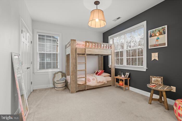 2520 Stone Cliff Drive Baltimore, MD 21209 - Photo 42 of 72 a bedroom with furniture and a window